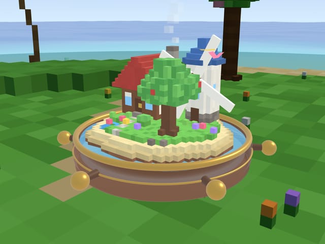 Windmill Island: a windmill, a red-roofed house and a tree on a tropical islet
