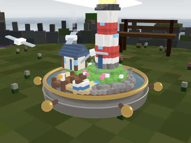 Lighthouse: a red and white lighthouse and a keeper's cottage on grey rocks